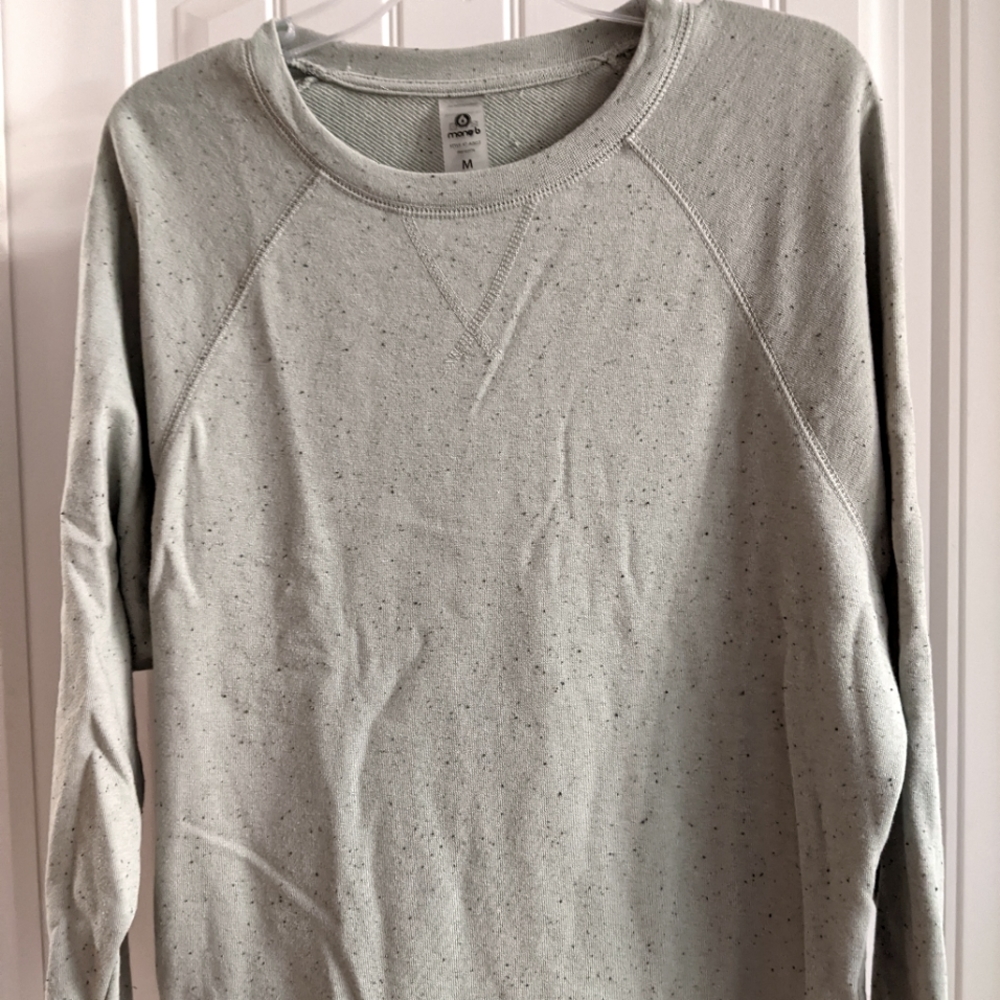 Light sage color with tiny blue dark green specks